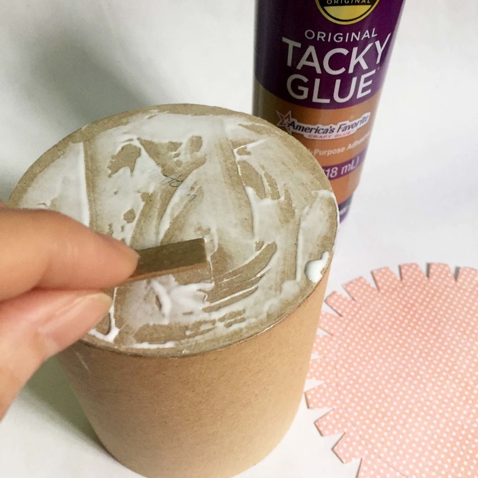 Apply some tacky glue onto the base.