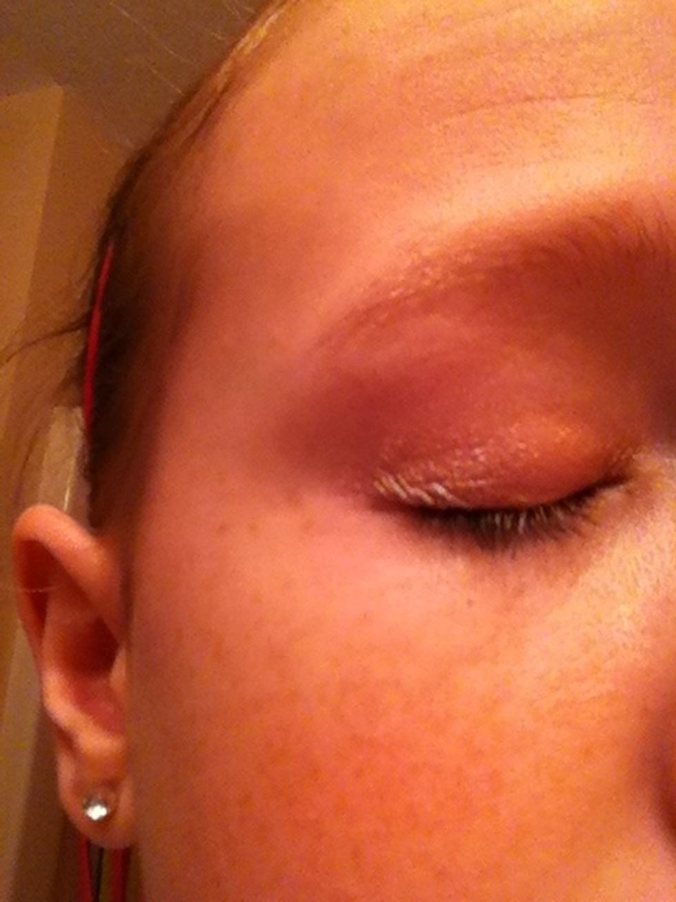 Apply sparkly base to the eye.