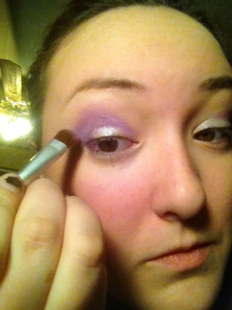 Apply starting at corner of eye following the crease line. Be sure not to cover up the silver and don't bring it all the way to the brow.