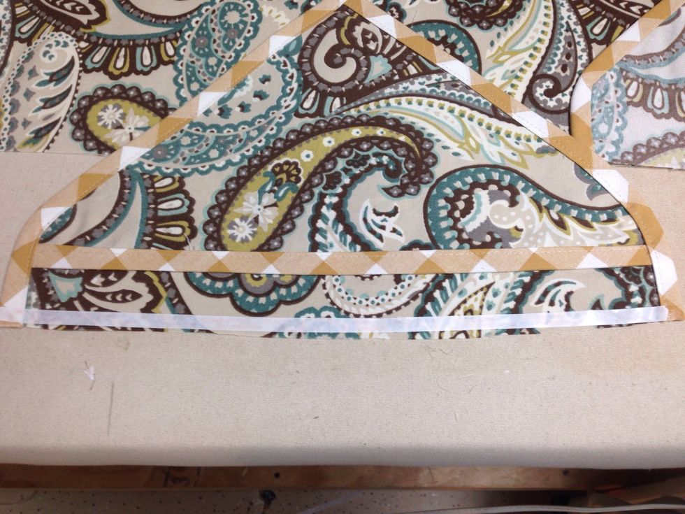 Apply Steam-A-Seam-II to front and back sides of the top of all points.