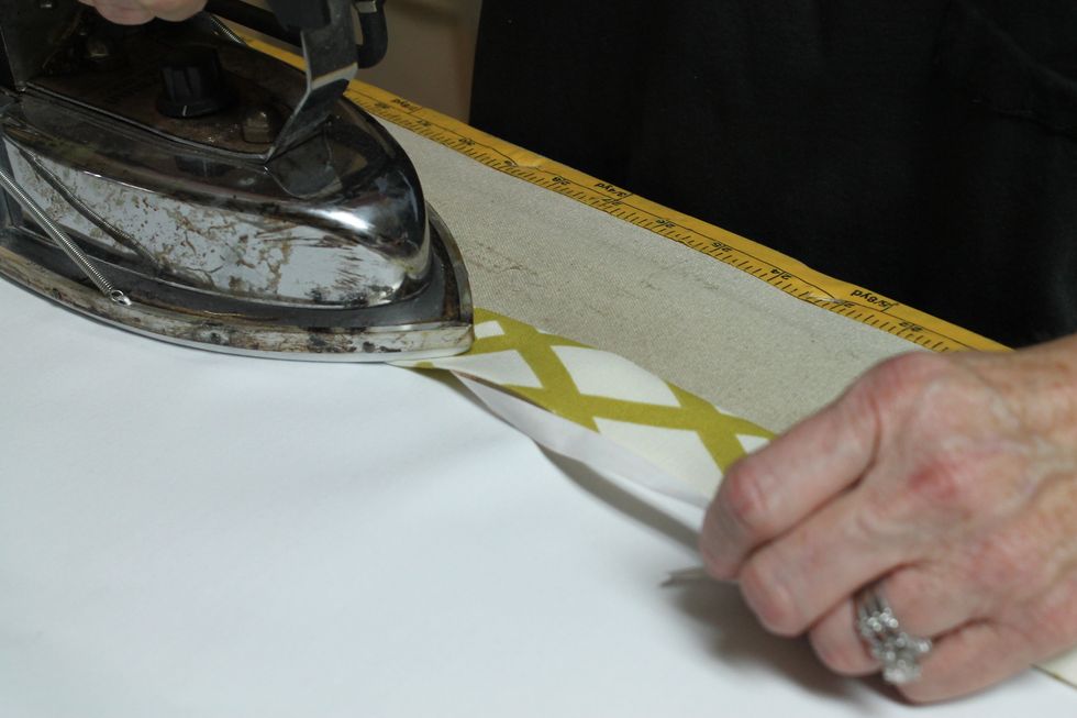 Apply SteamASeam2 to the top and bottom hems and press as you previously did on the side hems.