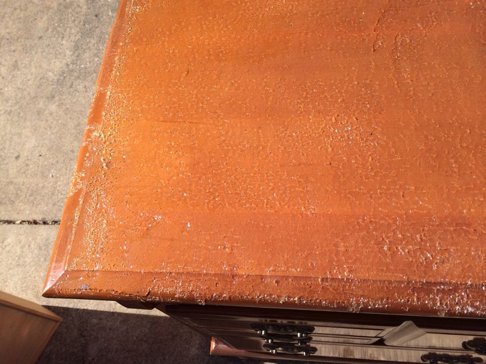 Apply stripping agent to remove varnish.