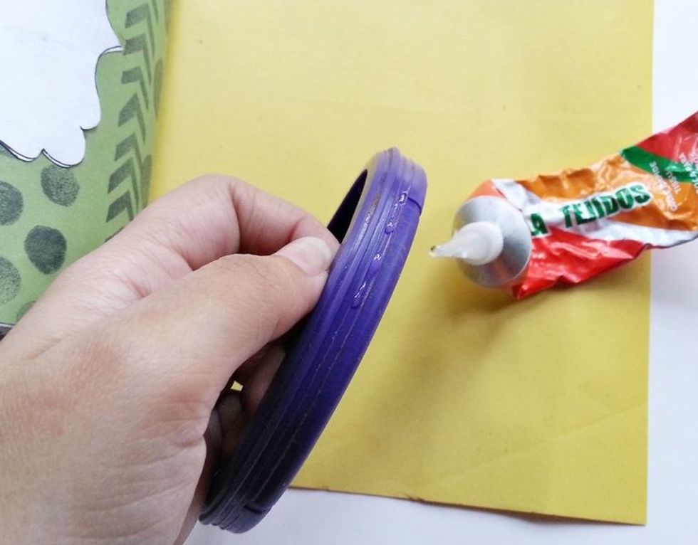Apply strong adhesive glue or super glue around the depth of the lid.