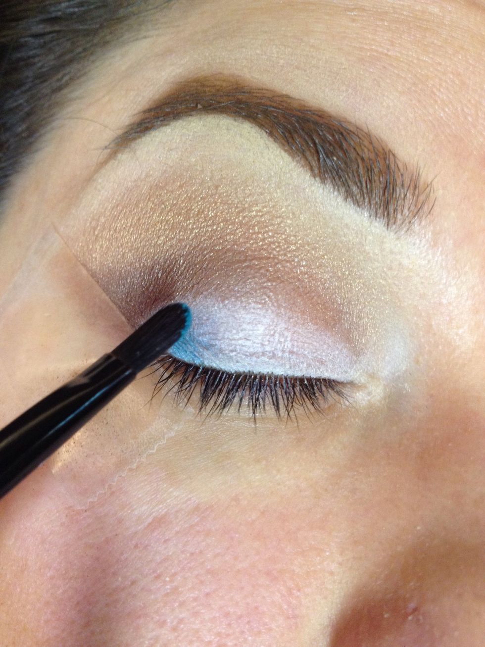 Apply teal color to outer corner.