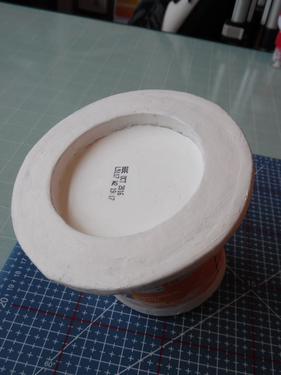 Apply texture paste over the jointed areas and once thoroughly dry, lightly sandpaper to a smooth finish.