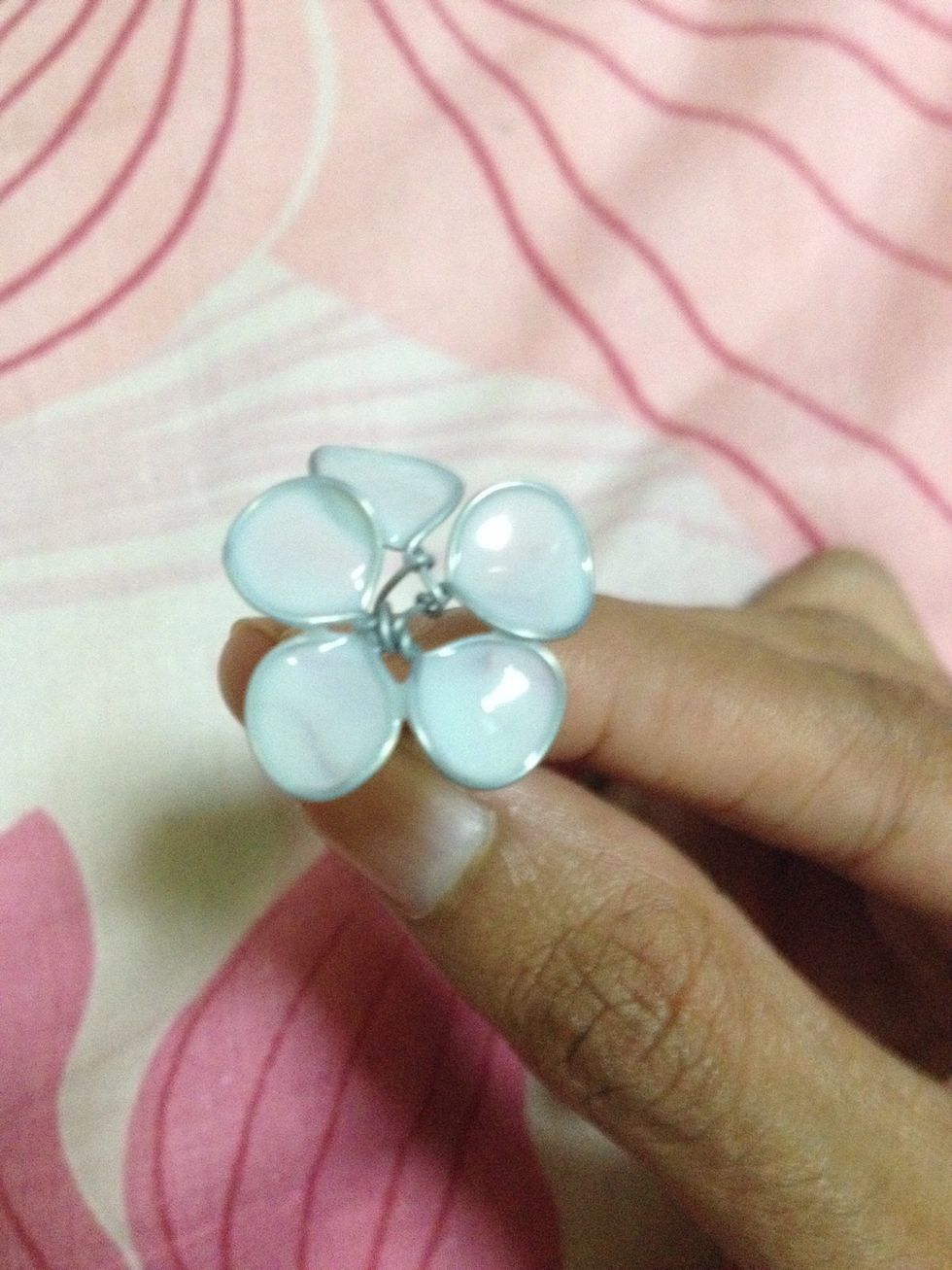 Apply the 2nd coat to cover up the translucent parts. You'll finish with opaque petals. You may choose to leave the petals translucent to create your desired effect.