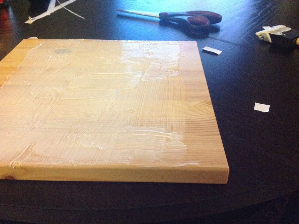 Apply the acrylic gel medium to the wood with the foam brush. You need to apply enough to ensure the photo will transfer, not so much that it will be gloopy, but enough that it will stick.