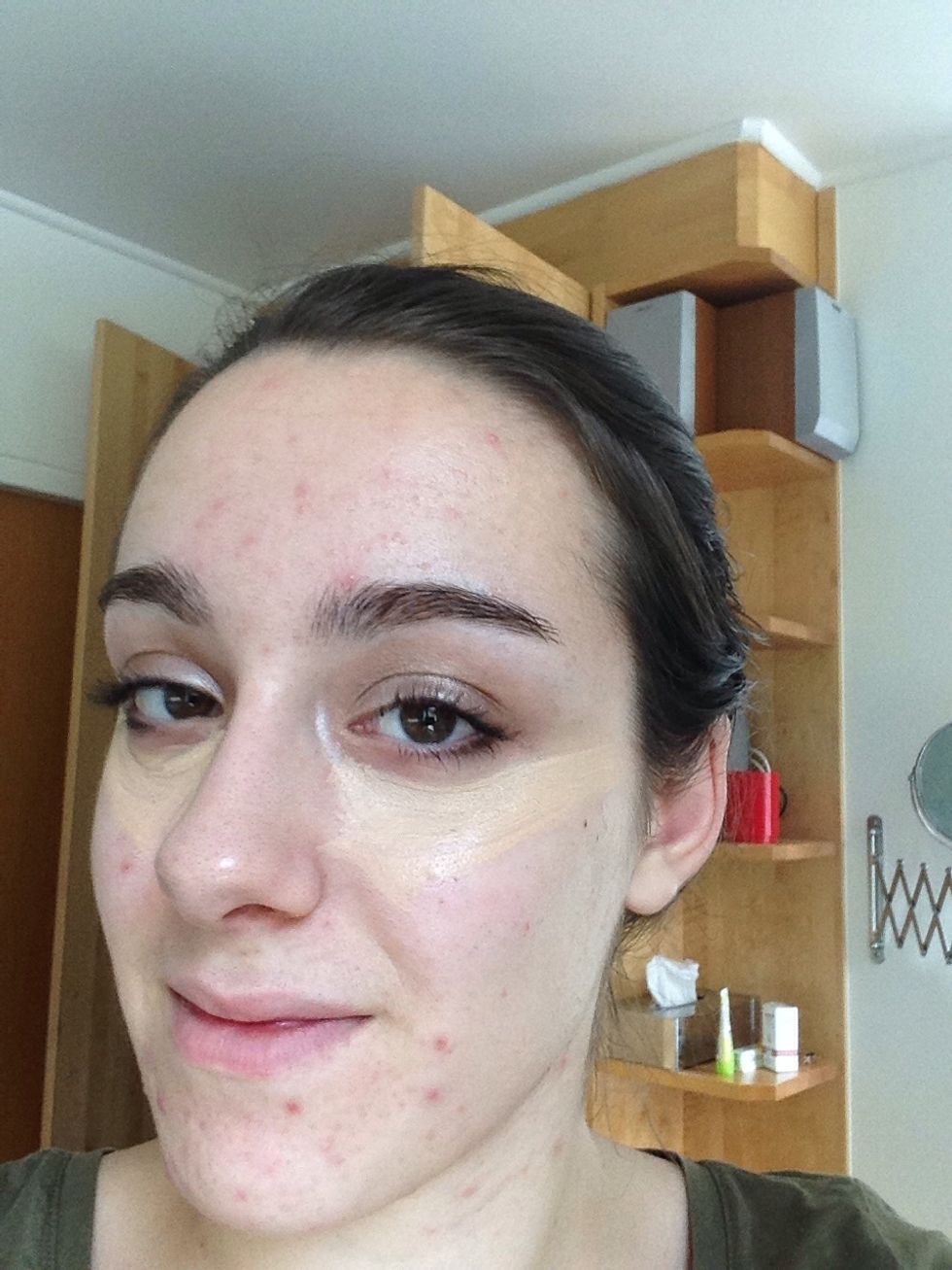 Apply the brightening concealer under your eyes