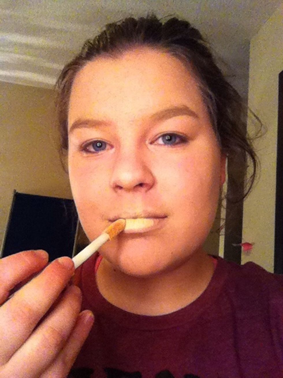 Apply the concealer to the lips