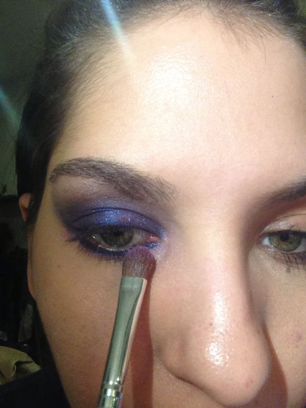 Apply the darker purple on your lower water line and blend it in to the black liner