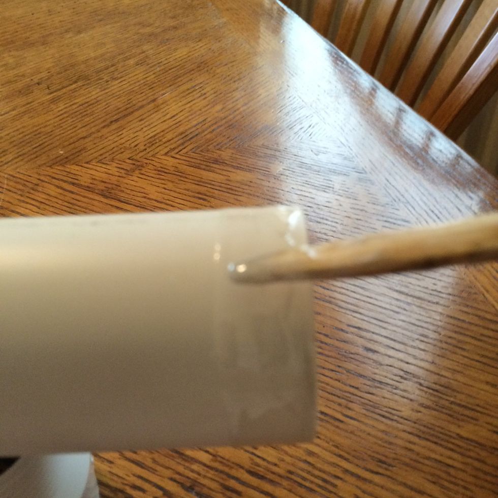 Apply the glue evenly on the other end of your 1 1/2" PVC pipe.