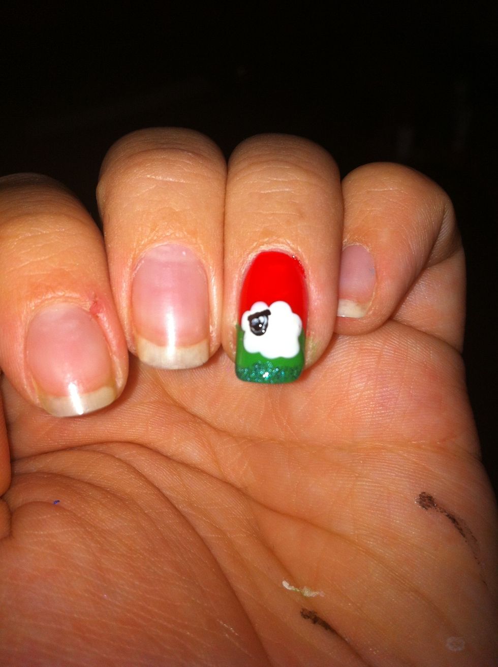 Apply the green glitter to the bottom of the nail.