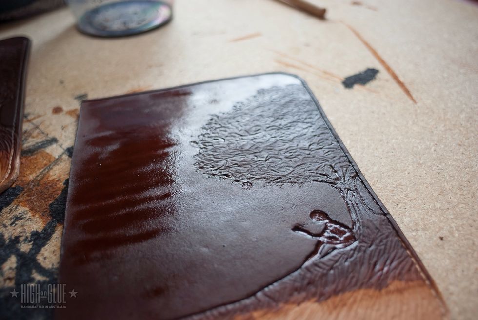 Apply the leather dye to the cover.