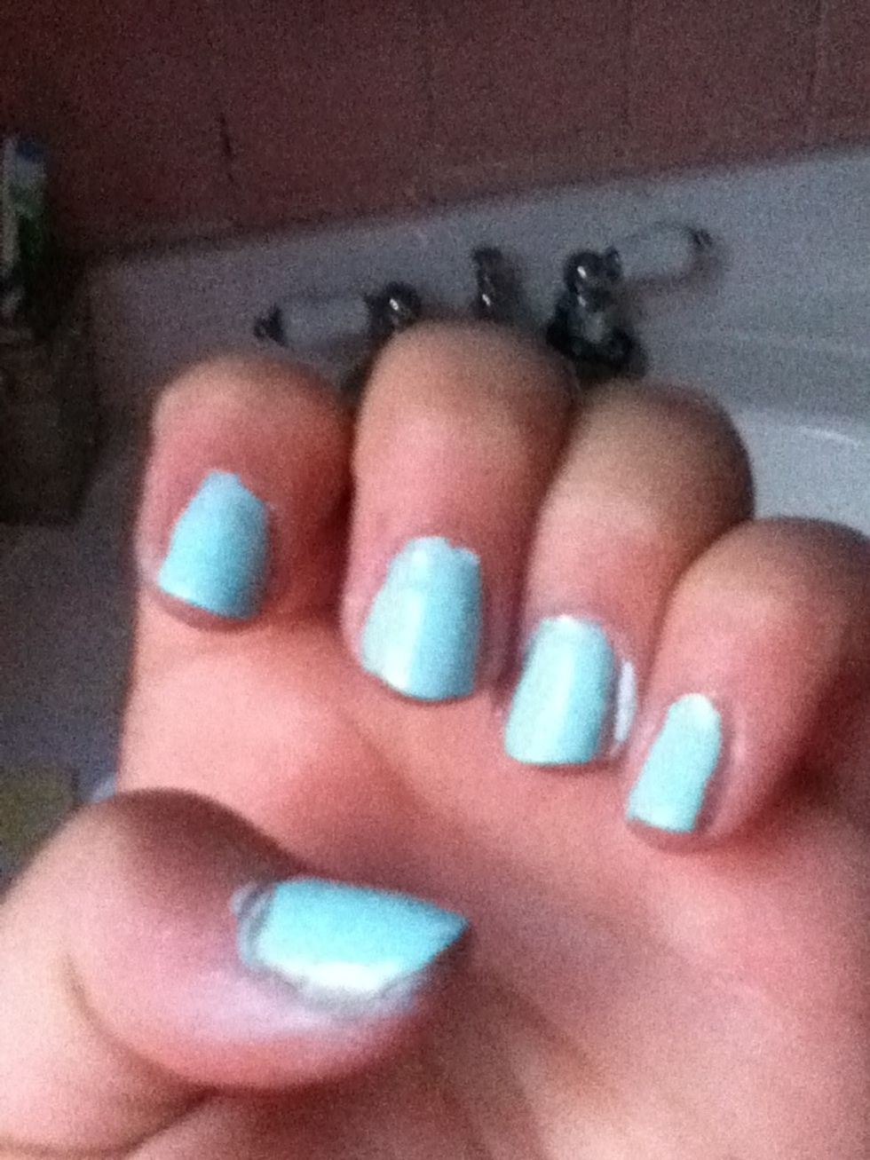 Apply the lighter color of your nails polish first wait for it to dry