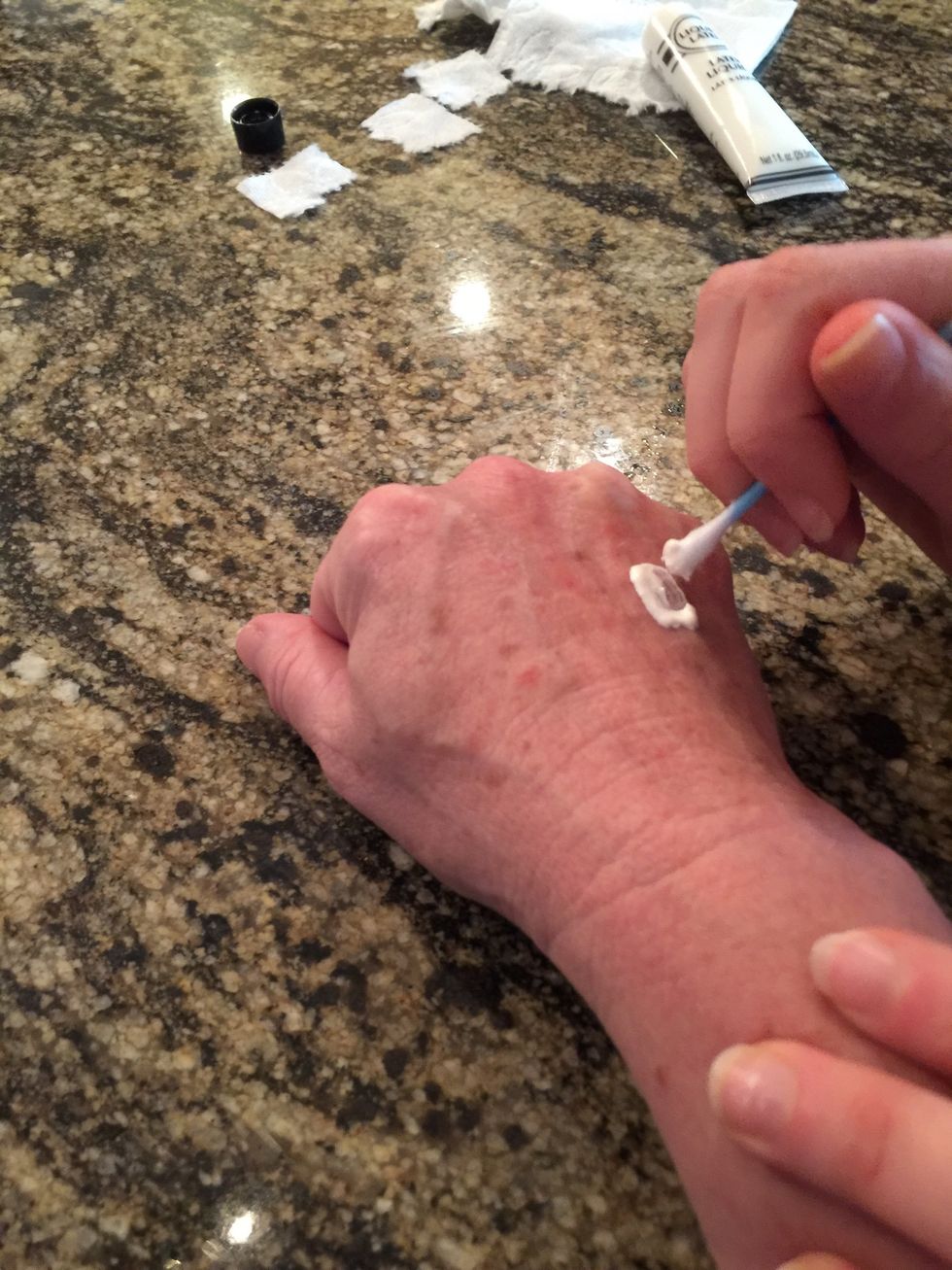Apply the liquid latex in about the size of the toilet paper to your skin.