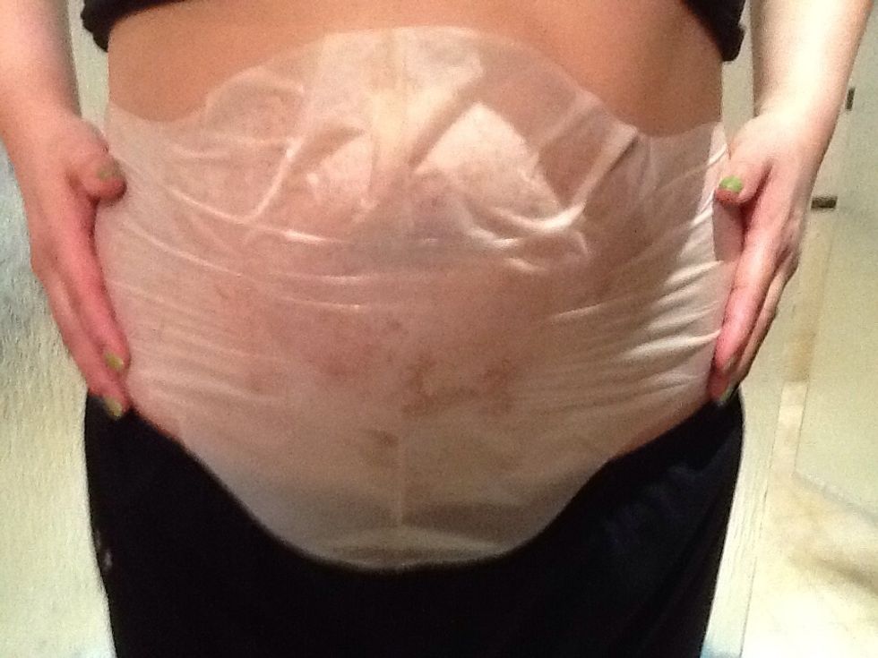 Apply the lotion side of the wrap to the skin on any area on the body that you want to tone and firm. Smooth out the wrap ensuring good contact to the skin.