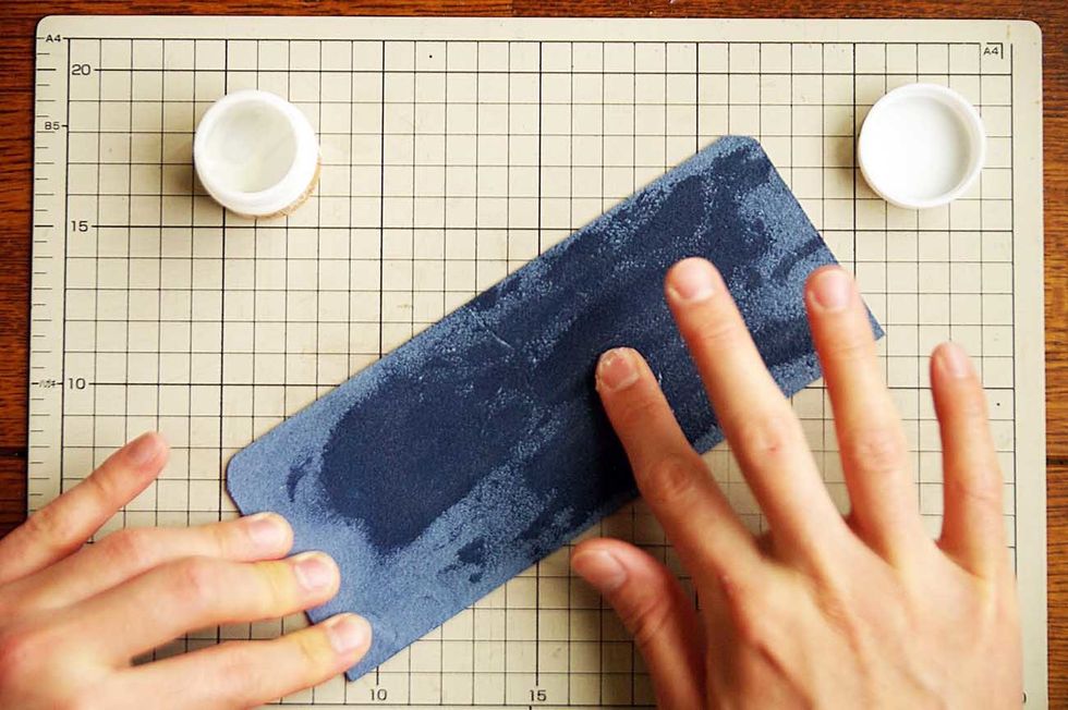 Apply the oil to the back side of the leather. Make sure you apply a heavy coat of oil.