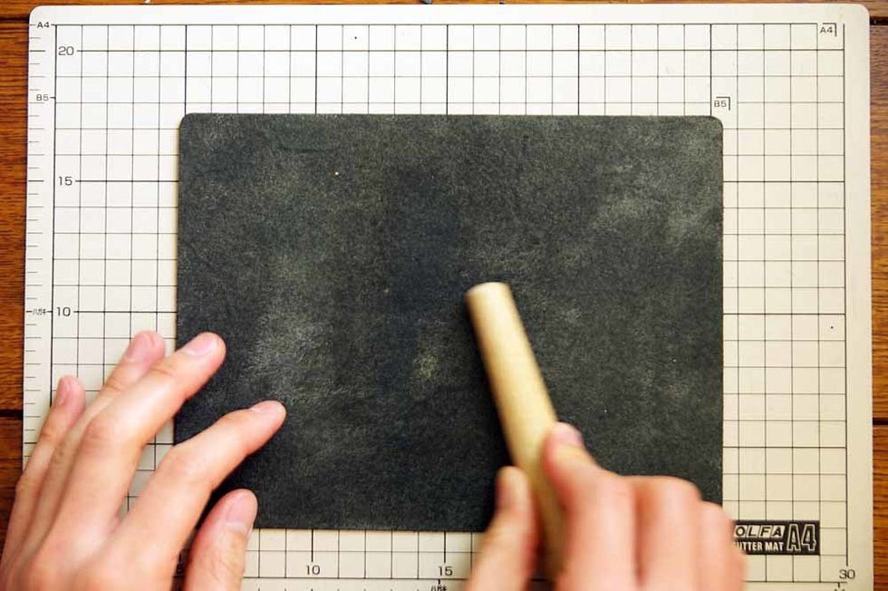 Apply the oil to the back side of the leather. Make sure you apply a heavy coat of oil.