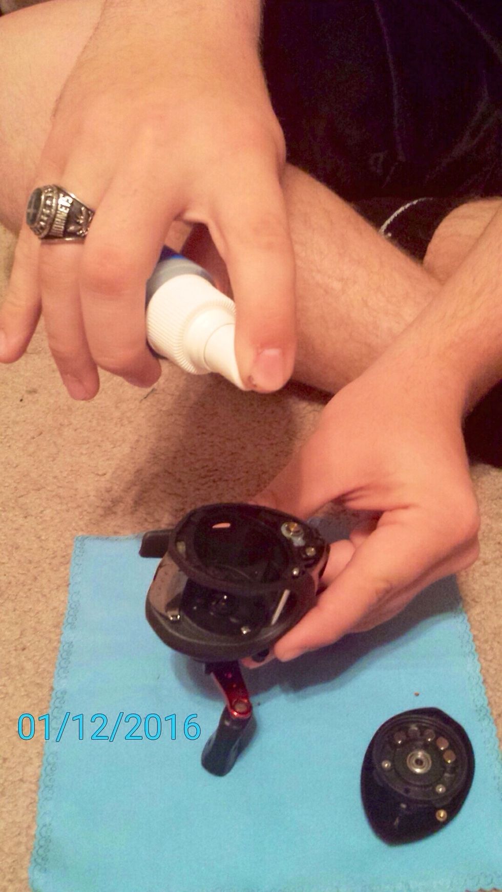 Apply the reel cleaner to all parts of the reel (let soak for five minutes).