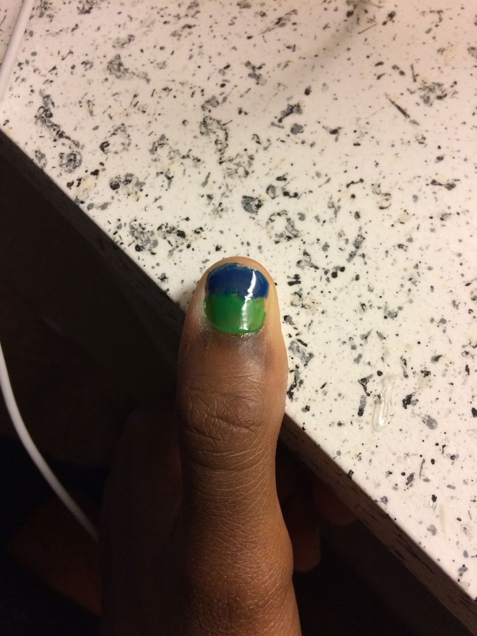 Apply the second color where the tape was removed from