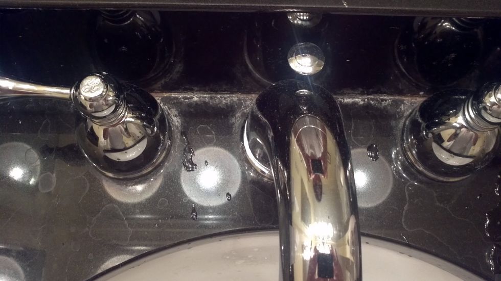 Apply the vinegar to the area you want cleaned. Might be best to pick an inconspicuous area first.