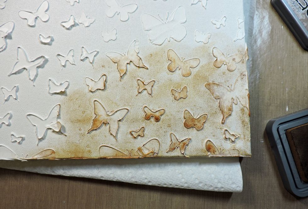 Apply the Vintage Photo Oxide Ink in the lower right corner of the canvas.