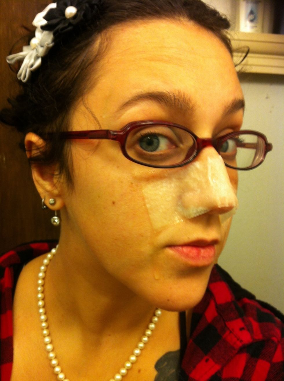 Apply to face. This will look sexy for a while until the paper towel hardens like papier m\u00e2ch\u00e9 .(I used my blow dryer on low heat to speed it up