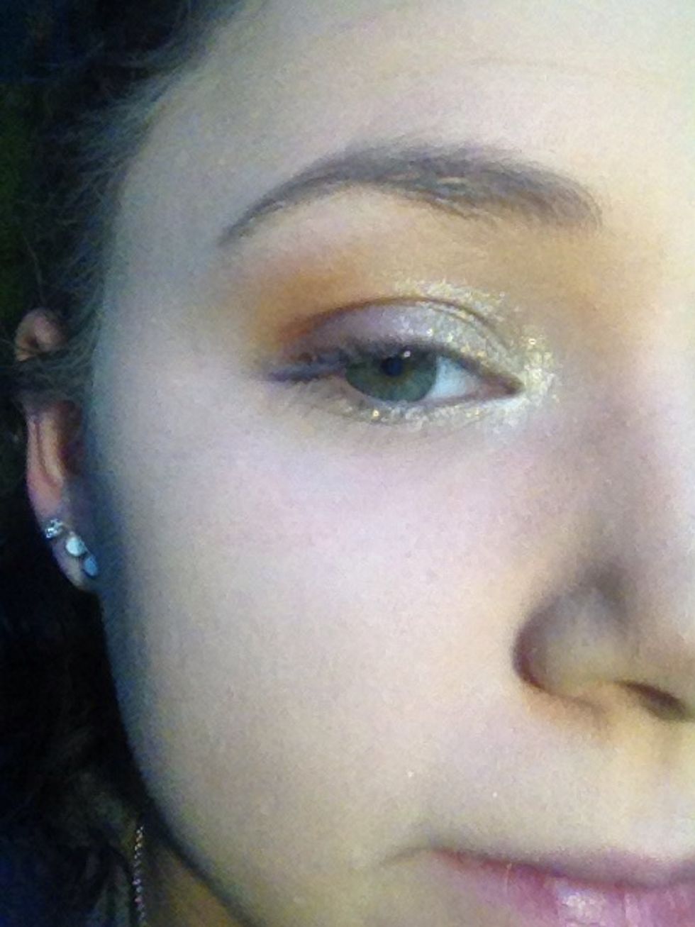 Apply to inner half of the eye, inner corner, and first half of bottom lash line.