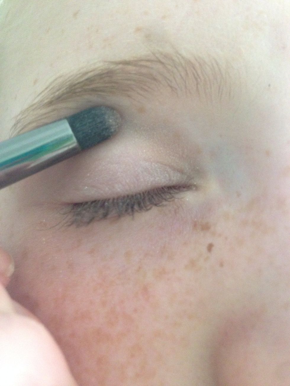 Apply to the top of your eye, a little lower then your eyebrow