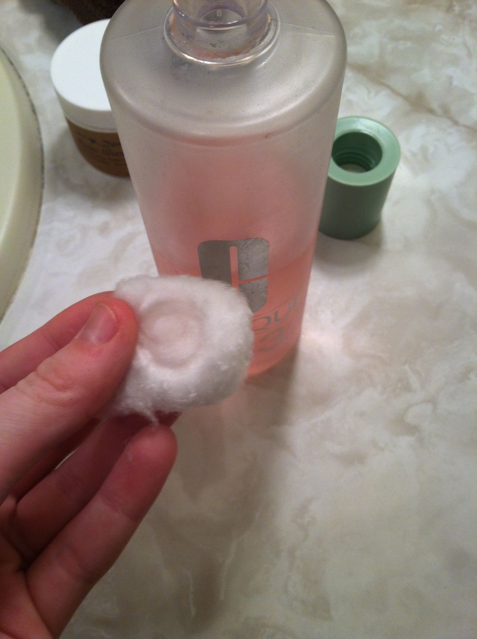 Apply toner to cotton ball