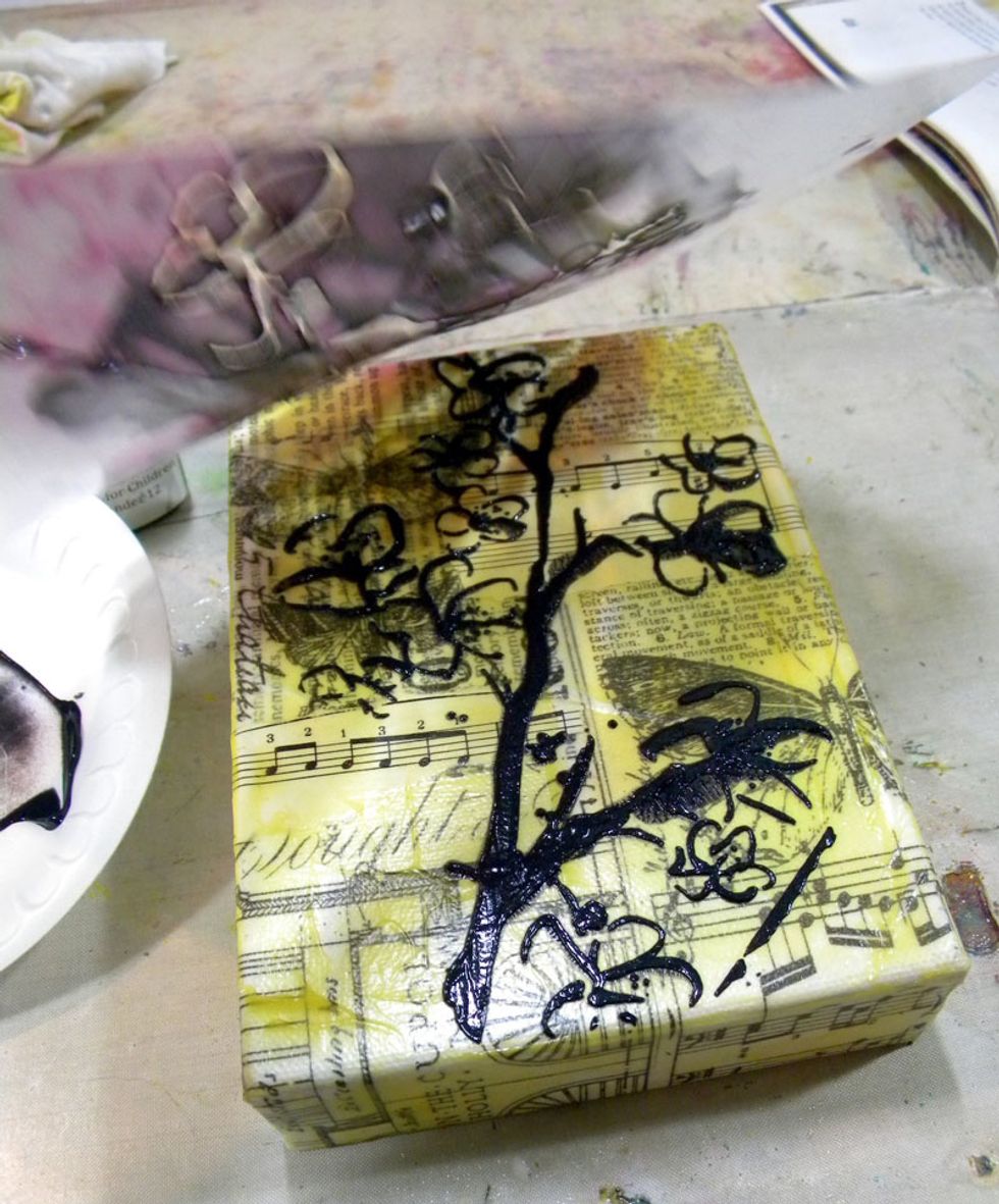 Apply Tuxedo Velvet through the Art Anthology Blossom stencil and clean up any edges. Clean the stencil off asap. Let dry completely.