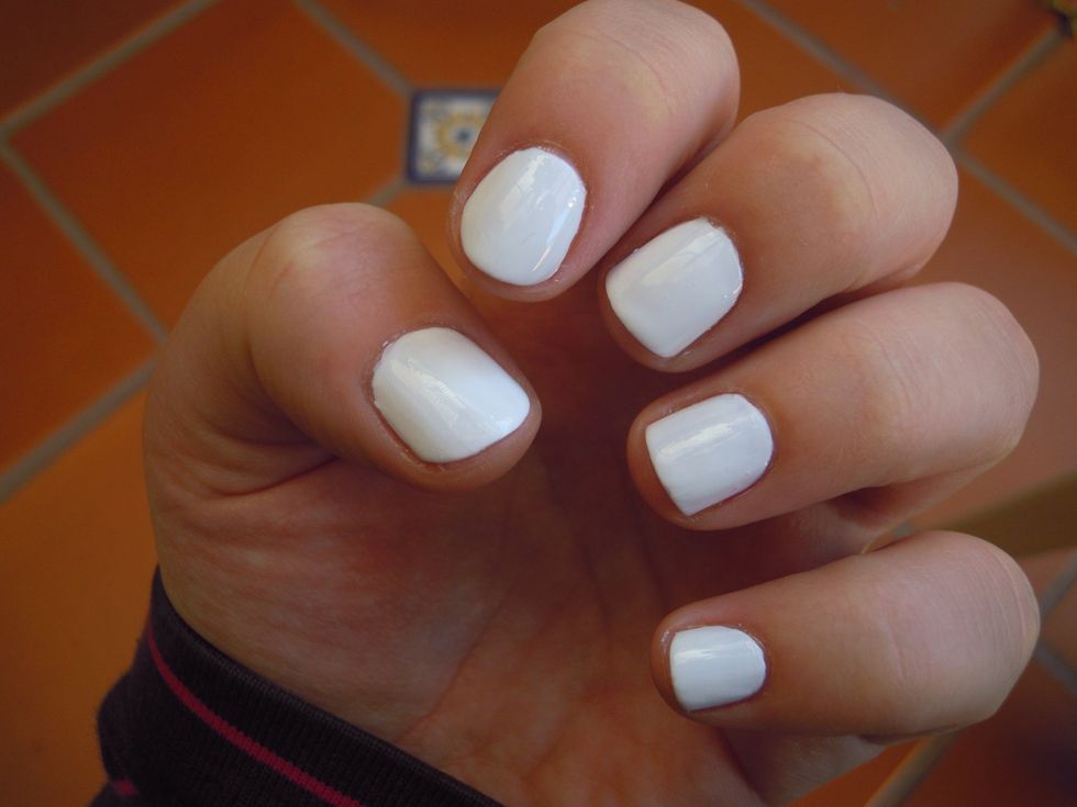 Apply two coats of white polish. Let dry.