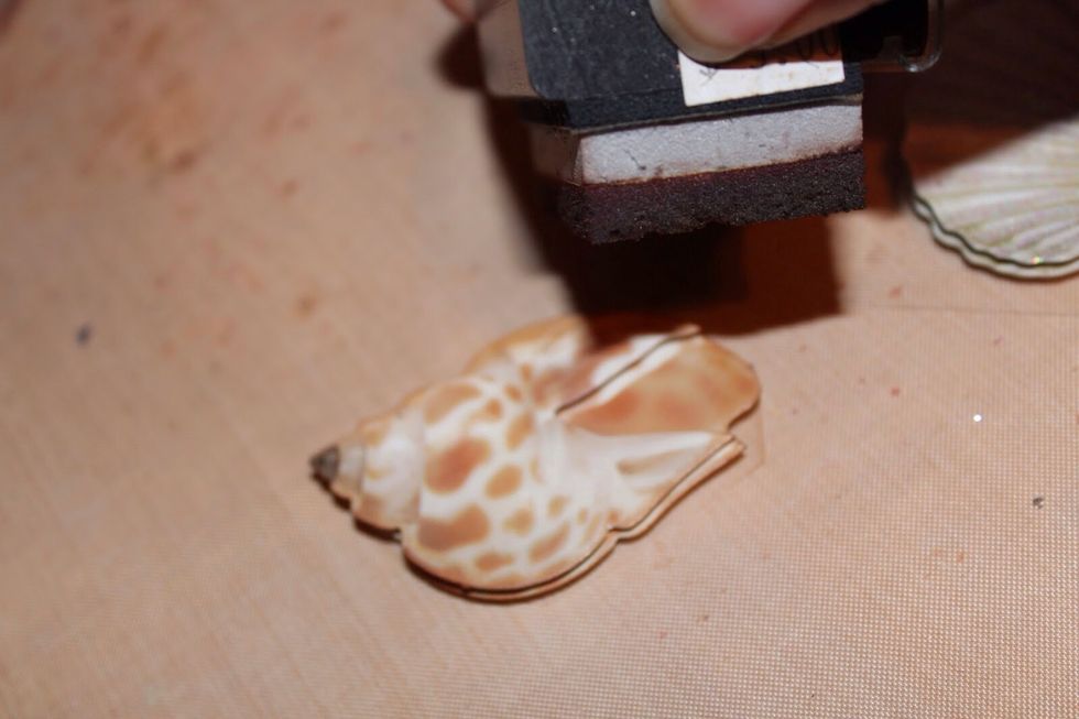 Apply vintage photo ink to 3-D stickers using foam brush.