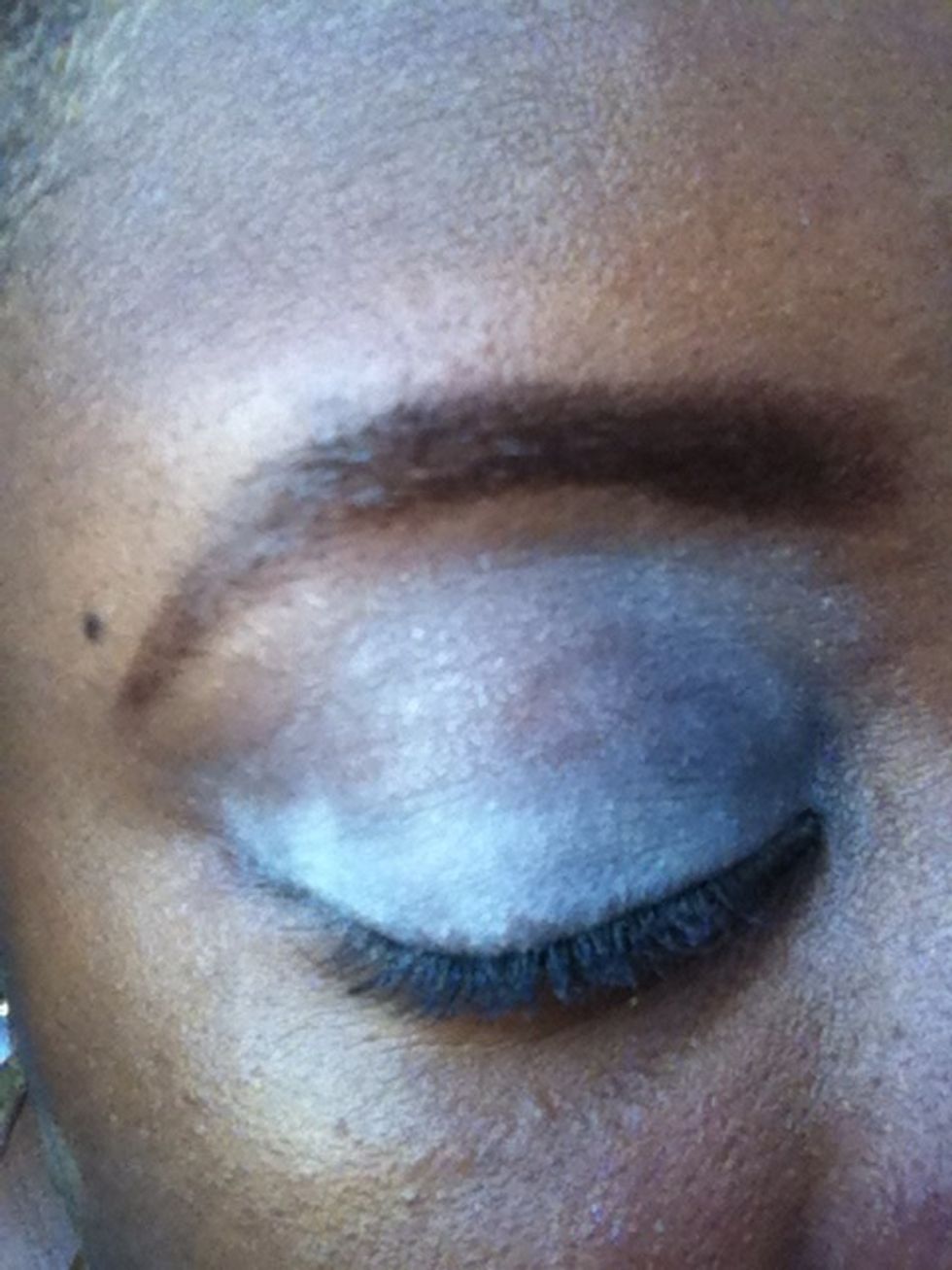 Apply white eyeshadow to make the colours stand out