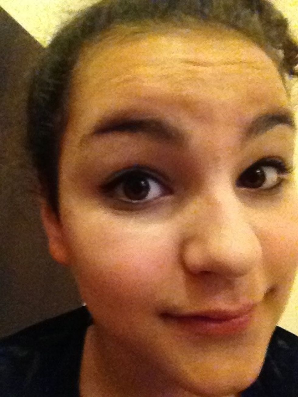 Apply winged eyeliner with gel eyeliner and an angled brush just use small strokes draw a template on your eye then colour it in.