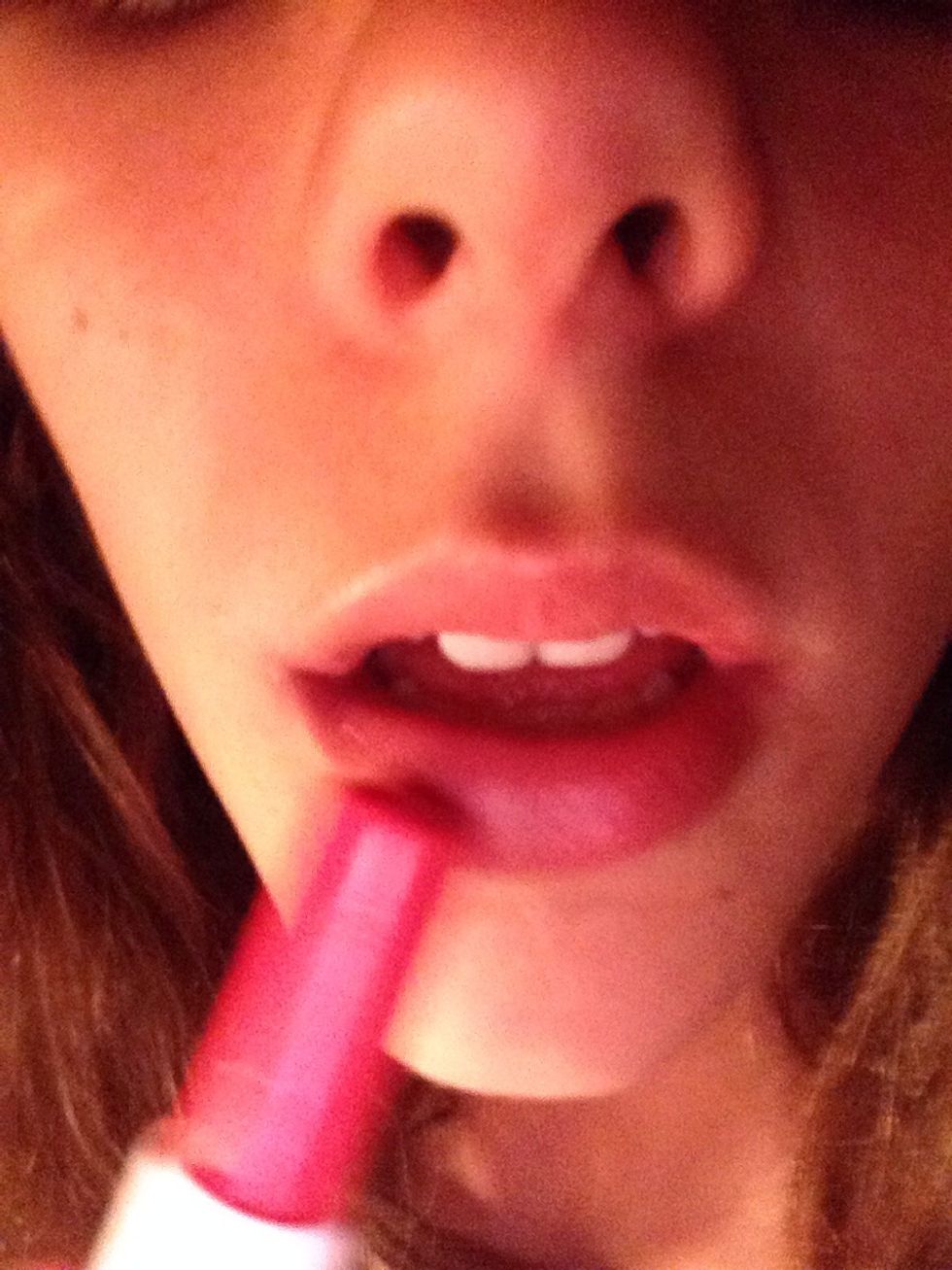 Apply your light lipstick on