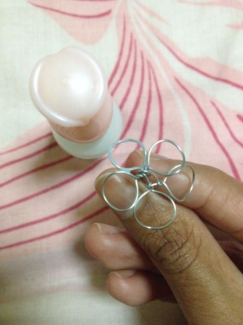 Applying the nail polish requires patience. I suggest using one which is closer to the watery state. Apply the nail polish to the rim of the petals and from there, spread over the whole petal without