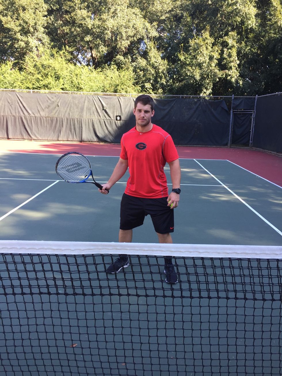 Approach the net: get into ready position (athletic stance, knees bent)