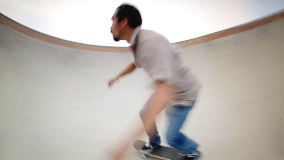 Approach the wall at an angle, with the intent of hitting the lip.