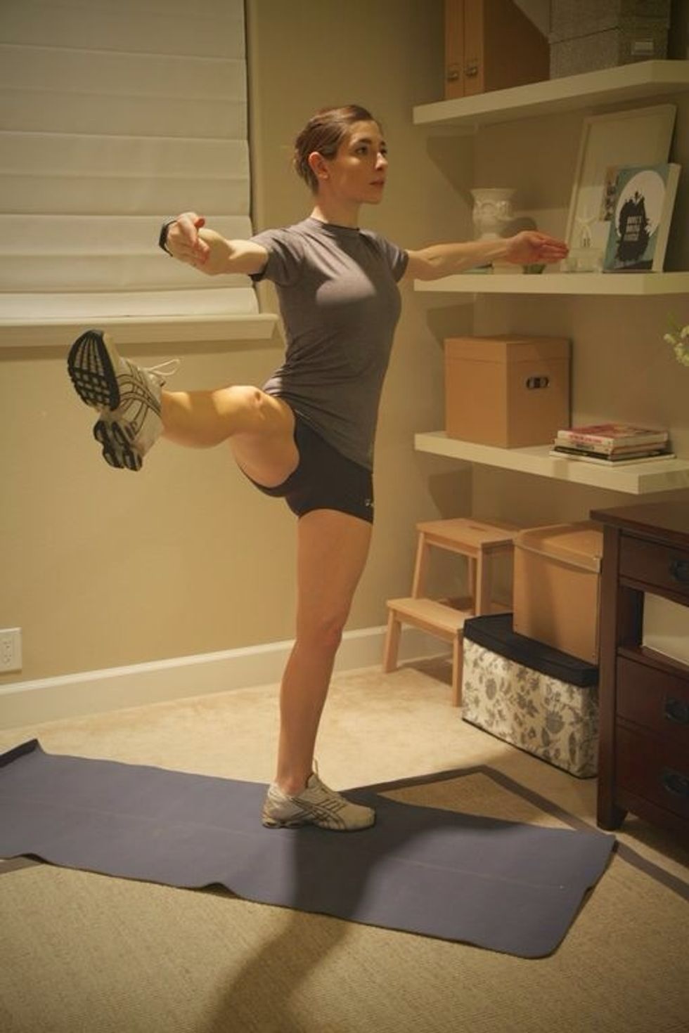 Arabesque Side: lift leg to the side, keeping hips even and the leg in line with the body. Hold for 4 counts ad return to starting.