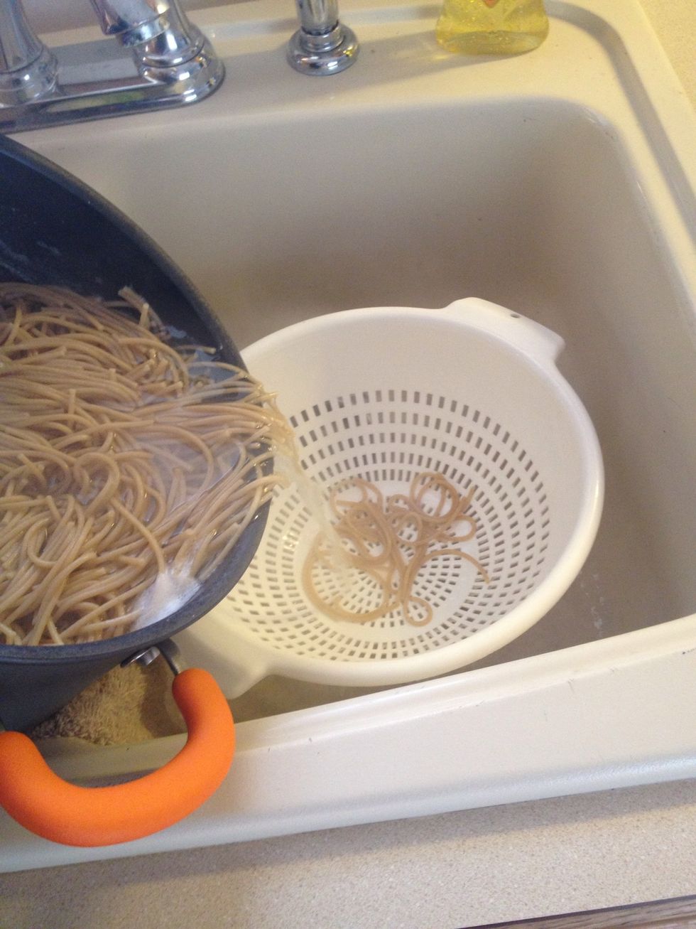 Are your noodles done? If so pour into a drainer b