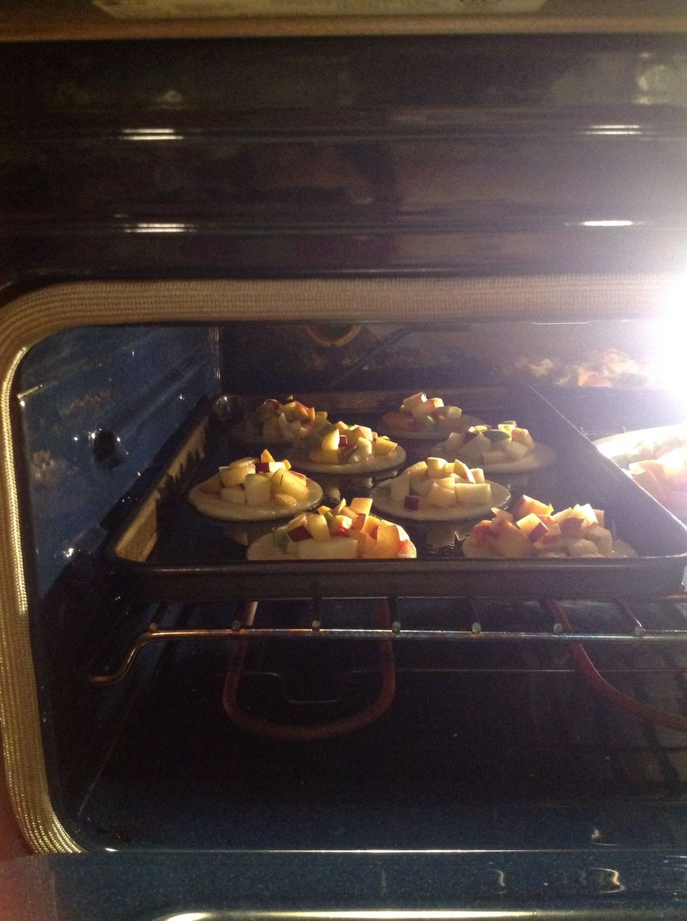 Arrange fruit onto the circles and place in the oven until the pastry is crisp and the fruit is cooked (about twenty minutes)