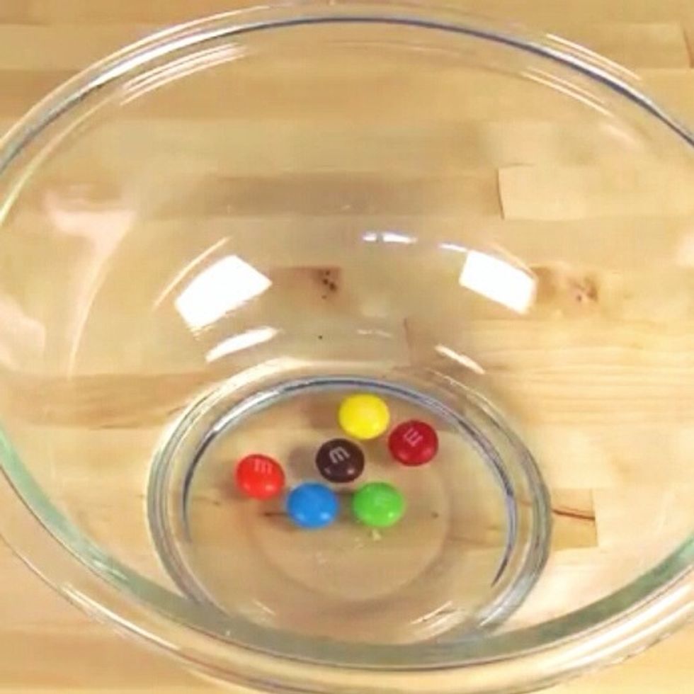 Arrange M&M Candies in the bowl.
