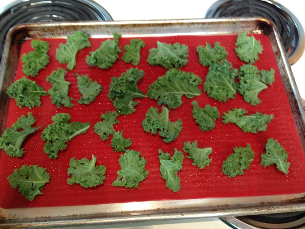 Arrange pieces in the oiled cookie sheet. Try not to overcrowd, but you can fit a bunch on there.