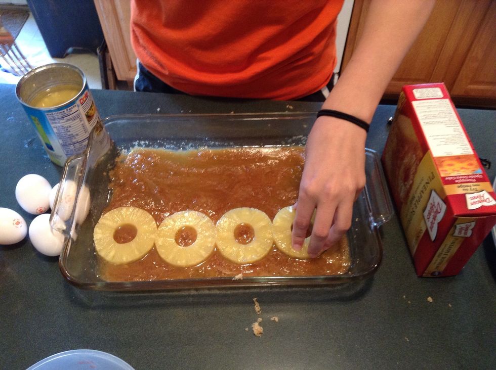 Arrange pineapple on top of the mixture