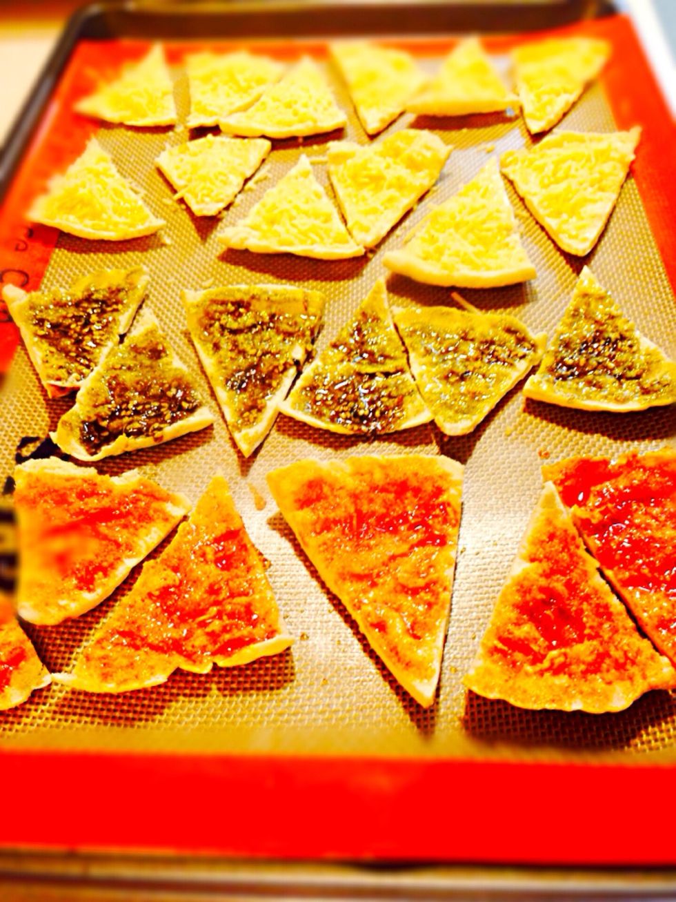 Arrange pita slices on non stick baking sheet and brush them in oil mixture. Bake for about 5-7 min. Watch for chips not to burn