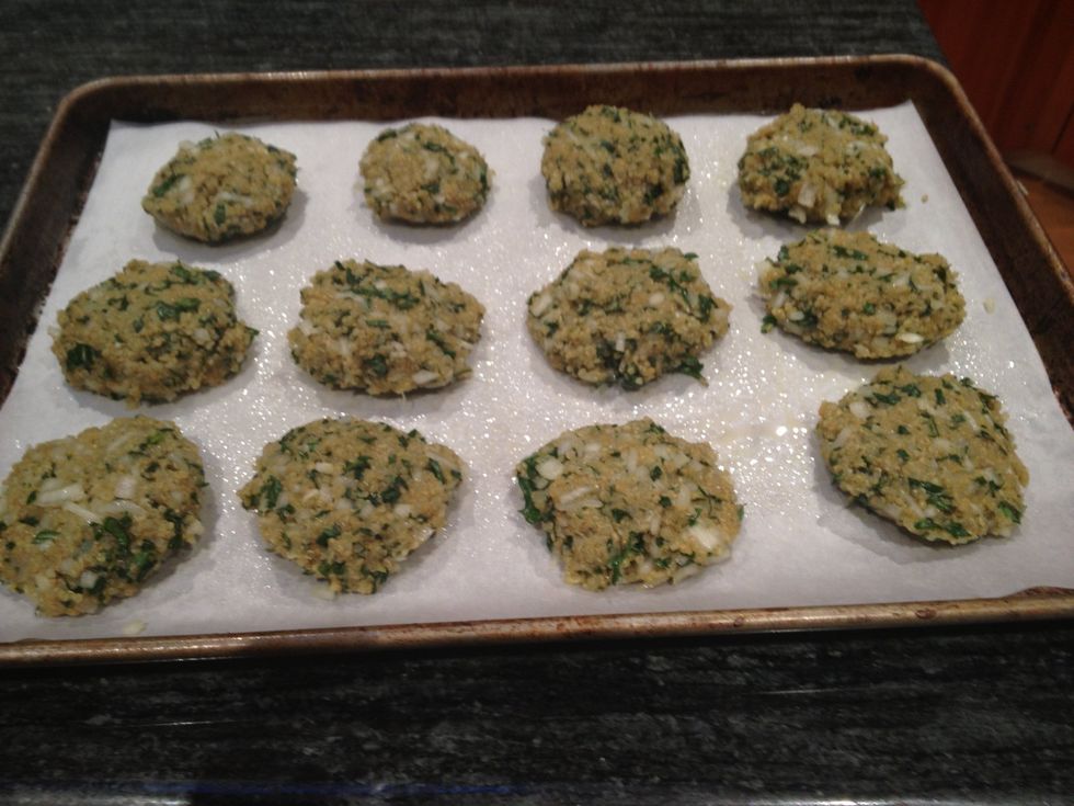 Arrange the 12 cakes on the oiled baking sheet. Make sure there is a bit of space in between each one.