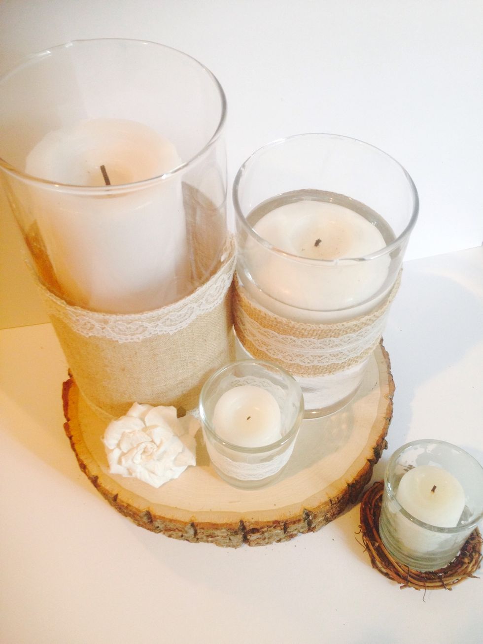 Arrange the 2 inch votives on and around the wooden slab.