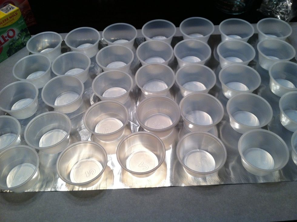 Arrange the 2oz cups on your work surface. I cover mine with aluminum foil because it can get sticky.