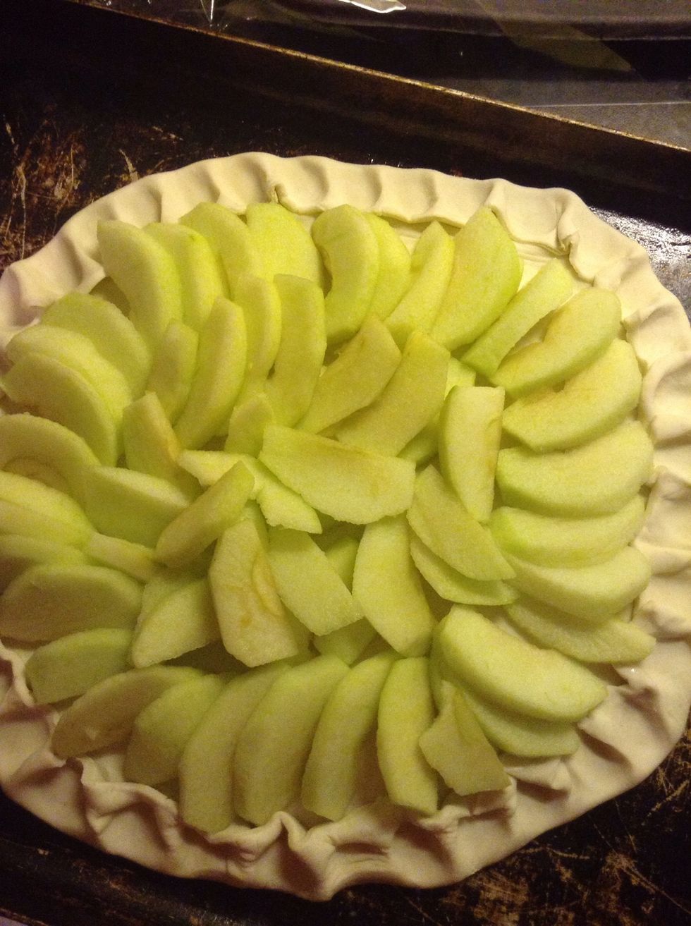 Arrange the Apple in a circle with the bigger pieces on the outside and the smaller pieces on the inside you can make it as perfect as you like,